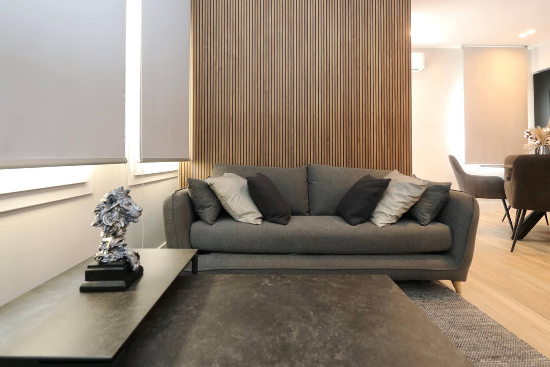 Comfort meets versatility — spacious living room sofa easily converts into a cozy bed for two.